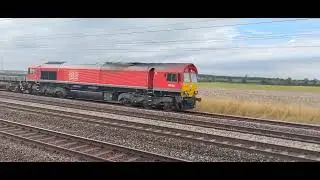 A metals train passing the sidings hotel