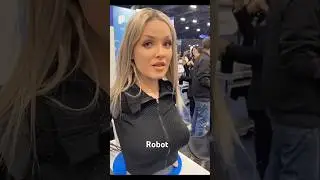 Future is now! A robotic face emerges from the shadows, its glowing eyes scanning the world. 👀