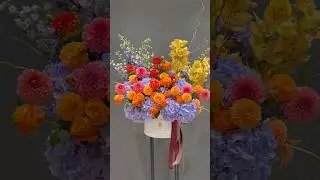 Lovely fall colours arrangement! #orchid #fallflowers #dahlias #roses #orange #yellow #delphinium