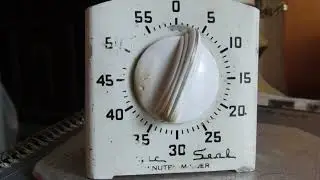 Five minutes ticking kitchen timer