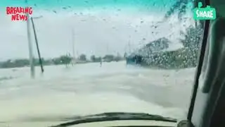 Vehicle bravely descended into the deep flood in Tuguegarao City, Philippines.