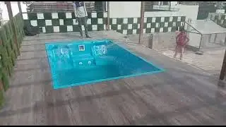 FRP swimming pool on roof top with jacuzzi and water filter . Above ground swimming pools