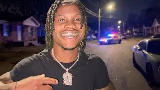 wearing a $10,000 chain in the hood