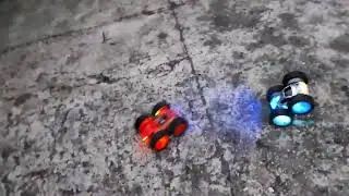 Bataille entre 2 mini-voitures t&eacute;l&eacute;command&eacute;es &agrave; leds tr&egrave;s robustes(RC Stunt Car) #1