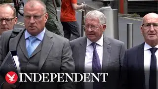 Sir Alex Ferguson arrives at Manchester Crown Court for Ryan Giggs assault trial