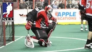 Calgary goalie Mike Poulin comes up with an incredible stick save!
