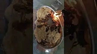 Melting Gold with fire on epoxy resine table, Olive wood
