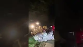 Omg bulldozer falls off of a flatbed trailer !!!!!!