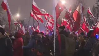 Mass protest outside parliament building in Warsaw amid Poland's change of power