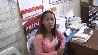 MARICEL GETTING POSTAL ID
