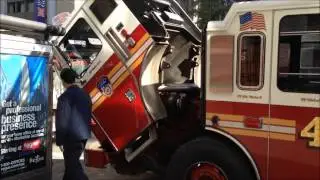 FDNY LADDER 4, AS NEVER SEEN BEFORE, BEING SERVICED BY FERRARA FIRE APPARATUS INC. MECHANICS.