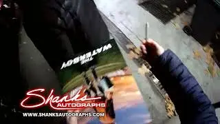 Adam Sandler signing autographs I promise despite you can't see his face :)