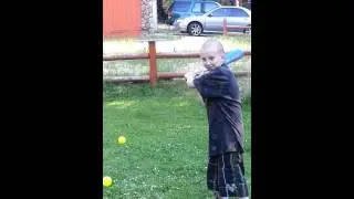 Nigel Holland playing ball brain tumor surviver never gives up.