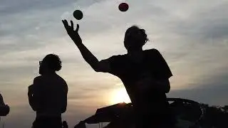 Juggling and Hooping on the Beach. NY www.flowjuggle.com Fire Arts, LED, Comunity, Learning, & More.