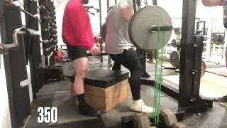 Doubled monster mini band rackable cambered bar squats for doubles! DE lower body training.