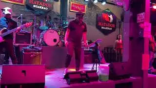 Looking for UFO? Rock Bottom guitarist plays hide & seek with camera. Matador Bar Pattaya