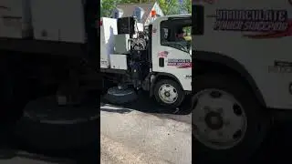 Street sweeper in action