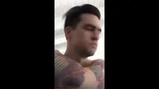 Shirtless Brendon playing piano