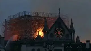 Haunting images show smoldering remains of 'Lady of Paris'