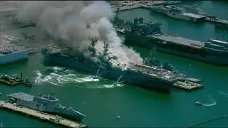 Fire blazing on USS Bonhomme Richard at Naval Base San Diego California