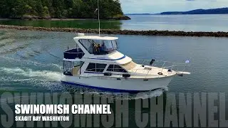 Boat Cruising Through Swinomish Channel Past Goat Island | Scenic Washington Coastline