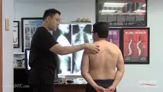 Jeweler with shoulder pain pressure HELPED by Dr Suh Specific Chiropractic