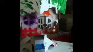 Painting a Calfant Cardboard Treehouse