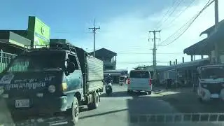 Market in front of Yak Jing Kambol factory