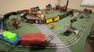 Marx 3/16 scale train on the inner loop, Lionel shoving platform on the outer loop