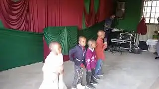 YOUNG CHILDREN PRAISING GOD