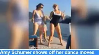 Amy Schumer shows off her dance moves on Swiss vacation