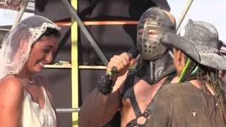 Lord Humungus marries two lovers inside Thunder Dome!