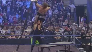 The Undertaker overcomes Edge's coordinated attack on 