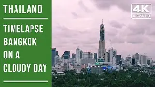 Bangkok Timelapse - From daylight to night with a cloudy sky (4k)