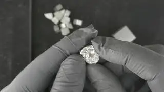 What does hafnium metal look like?