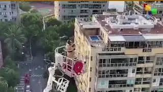 Rio De Janeiro Fireman Plays Trumpet For Quarantined Residents