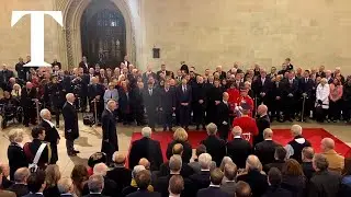 King Charles unveils a plaque marking where Queen Elizabeth II laid in state