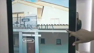 El uso de una pantalla touch en un una feria