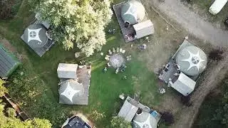 Fire pit zoom out to all of Glamping @TheGroveGlamping