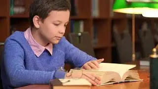 Studying In A Library Stock Video