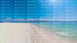 Tropical island with a white beach. Mahaba Island, Philippines.