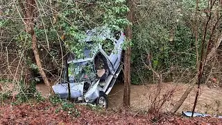 SUV plunges 20 feet down ravine in Southwest Atlanta
