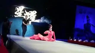 2 Models FALL in Long Gowns during Lanling Fashion Design Art Center 2018 Fashion Show