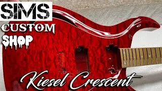 Kiesel Crescent Guitar - Transparent red quilted maple finish by Sims Custom Shop