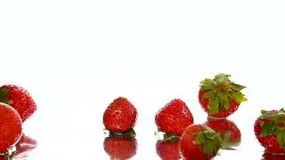 LIBRE strawberries falling on a surface on a white background 10438 full hd