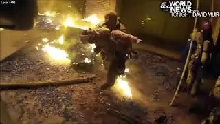 Dramatic video shows firefighter saving child thrown from third floor to avoid fire