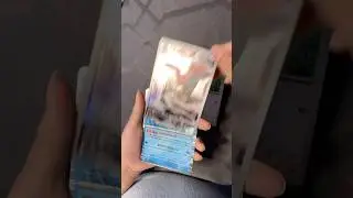Pokemon ripping Japanese booster pack