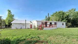 Se Vende Mobile Home con 2.28 Acres de Terreno de 3 Dormitorios 2 Baños en St Cloud, Florida 34773