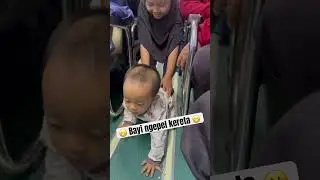 Bayi ngepel kereta