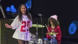 Monroe and Moroccan performing Christmas Wrapping at Mariah Carey's show in Houston, TX
